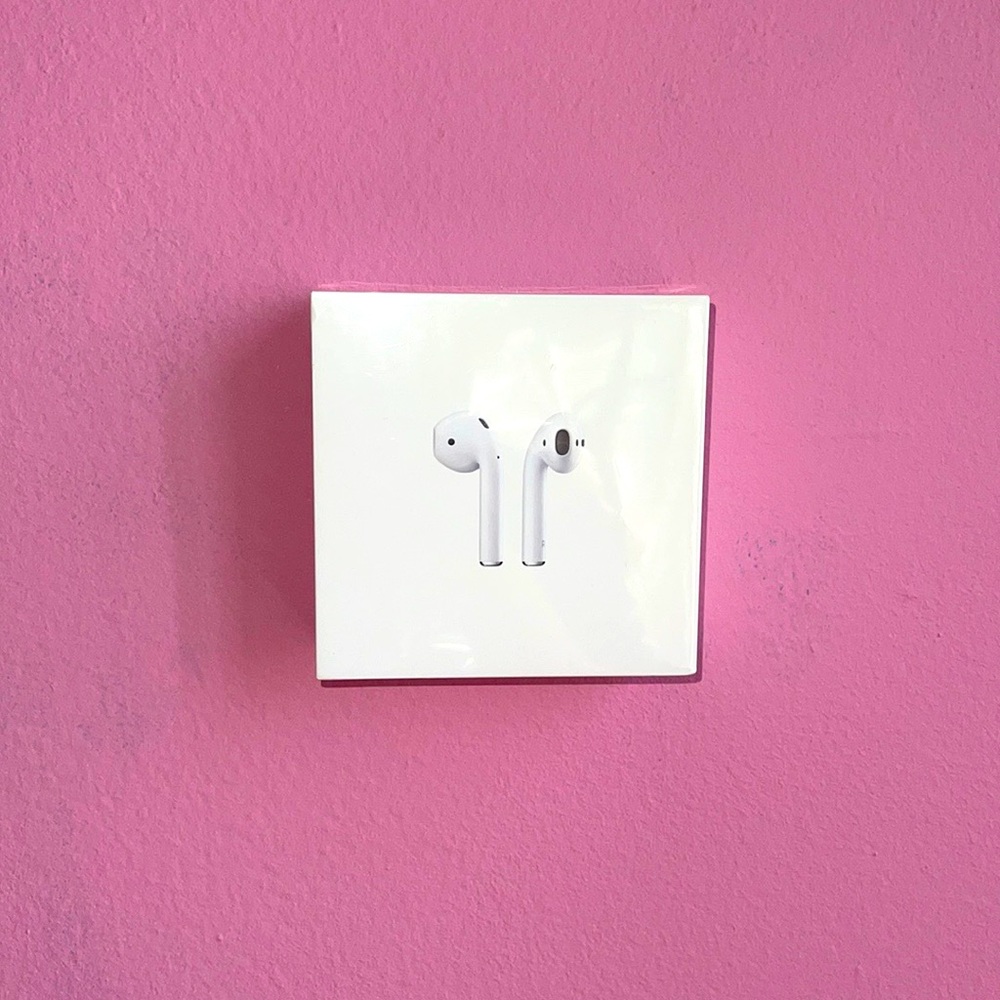 Brand new AirPods with a charging case